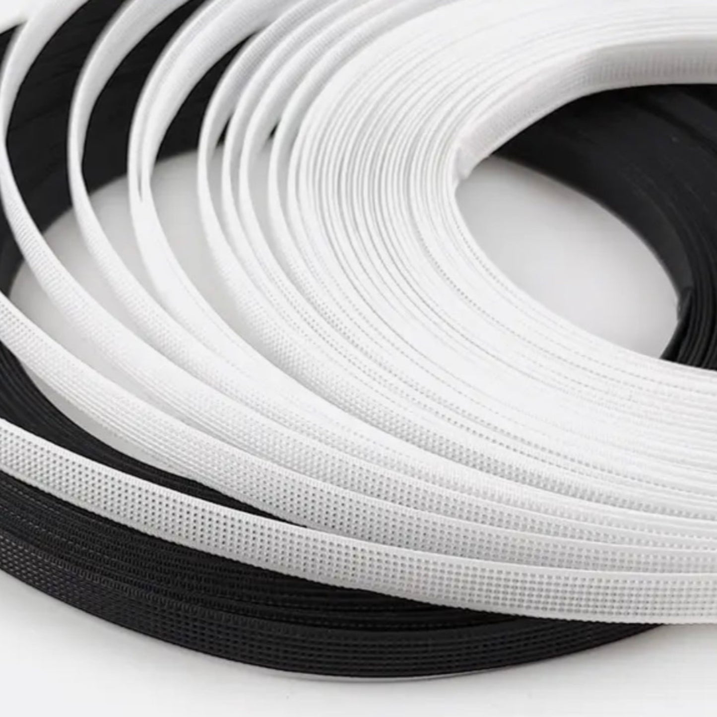Black and white sew-through polyester boning