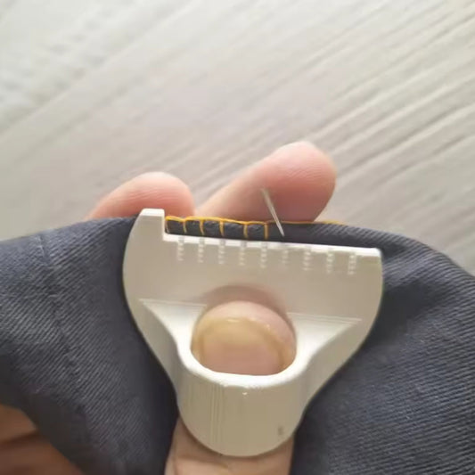 hand held stitching tool