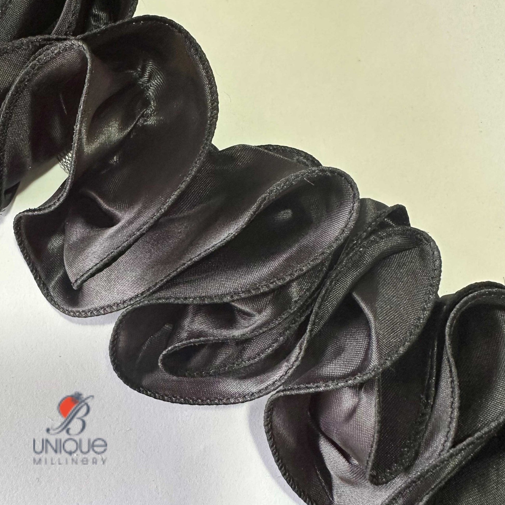 black ruched 3d ribbon