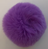 lilac fur ball from B Unique Millinery