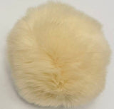 soft yellow fur ball from B Unique Millinery