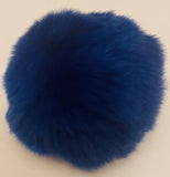 Royal Blue fur ball from B Unique Millinery