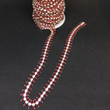 Bling on a Strand - dark red set in silver