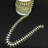 Bling on a Strand - pale green set in silver
