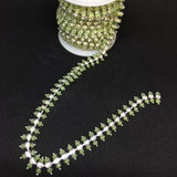 Bling on a Strand - pale green set in silver