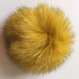 Golden Yellow Fur Ball from B Unique Millinery